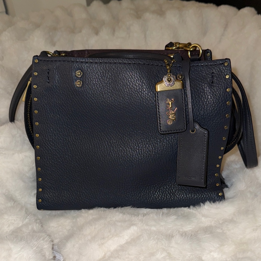 Coach Rogue 25 - Navy with Rivets & Oxblood Interior